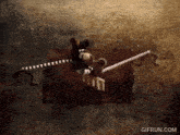 a gif from gifrun.com shows a mouse riding a skeleton