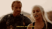 a man and a woman are standing next to each other and the woman is saying " little bitch you 're fucked "