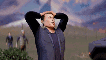 a man in a suit is holding his head in his hands