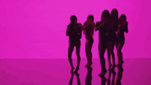 a group of women are dancing in front of a tv screen that says ' loving about it '