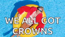 a woman in a bathing suit is floating on a yellow raft in a pool .
