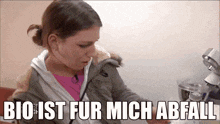 a woman is standing in front of a mixer and the caption bio ist fur mich abfall