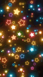 colorful stars on a dark background with a black background