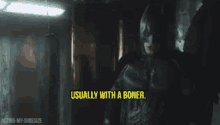 a man in a batman costume is saying usually with a boner