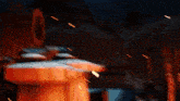 a blurred image of a person holding a fireball