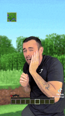 a man in a black shirt with the letter j on it