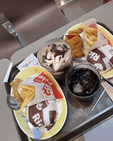a tray of food including a rice burger