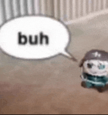 a stuffed animal with a speech bubble that says ` ` buh ` ` .