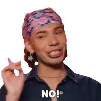 a woman wearing a headband and a necklace says no