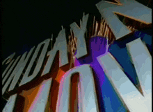 a colorful sign that says ' sunday morning ' on it