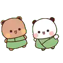 a couple of panda bears standing next to each other .