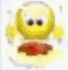 a blurred image of a yellow cartoon character with a big mouth .