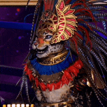 a leopard in a colorful costume with feathers