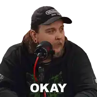 a man wearing a black hat that says nintendo new york