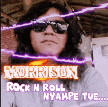 morrison rock n roll nyampe tue written on a picture of a man