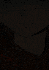 a close up of a cartoon character 's face with the letter o on her eye
