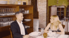 Flirty Waitress Flirt GIF - Flirty Waitress Flirt Eating In A Restaurant GIFs