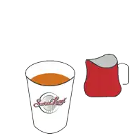 a cup of sweet land coffee is being poured into