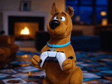 scooby doo is holding a game controller in his hands
