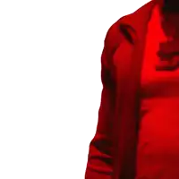a man wearing a red shirt and a red jacket has a necklace around his neck with the letter k on it