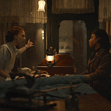 two women are talking in front of a window that says ' bakery '
