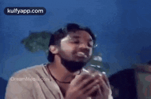 Alcohol Bottle As Baby.Gif GIF - Alcohol Bottle As Baby Alcohol Kamal Hassan GIFs