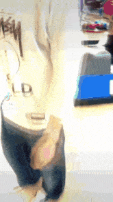 a blurred image of a person 's back with ld written on it