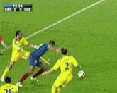 a group of soccer players are playing a game and the time is 75:12