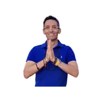 a man wearing glasses and a blue polo shirt is praying with his hands together