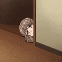 a girl is peeking out of a doorway and looking at the camera