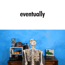 a skeleton wearing glasses sits in front of a blue wall with the word eventually below it