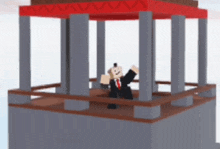 a man in a suit and tie is standing in a building with a red roof