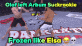 two men are fighting in a boxing ring with the words olaf left arbum suckookie frozen like elsa