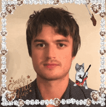 a picture of a man with a cat holding a guitar and the words smile sparkle shine