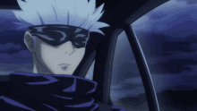 a cartoon character wearing a mask and a scarf looks out of a car window