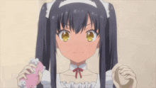 a girl in a maid outfit is holding a soap bar