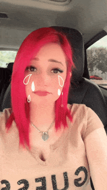 a woman with red hair is wearing a t-shirt that says chee