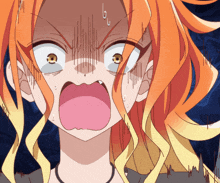 a close up of a girl 's face with a surprised look on her face