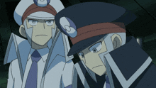 two cartoon characters are standing next to each other and one has a s on his hat