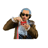 a person is holding a raspberry with their mouth open