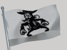 a black and white flag with a pixelated image of a cowboy on it