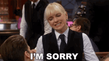 a woman says i 'm sorry to a man