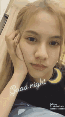 a woman with a crescent moon behind her and the words good night on the bottom