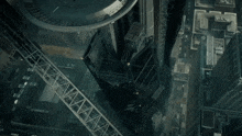 an aerial view of a city with a building that says ' a ' on the side