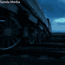 a picture of a train with sanda media written on the bottom right