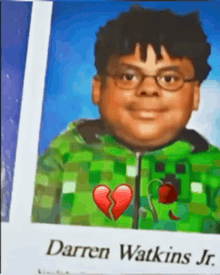 a picture of darren watkins jr. with a broken heart on his chest