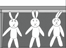 three rabbits are standing next to each other and one has a cross on its face