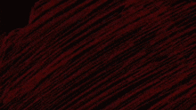 a dark red background with a heart in the middle