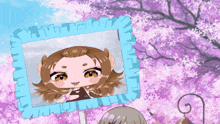 a picture of a girl with a blue ruffled frame