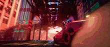 a car is driving through a city at night
